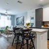 Kitchen with island and bar stool seating