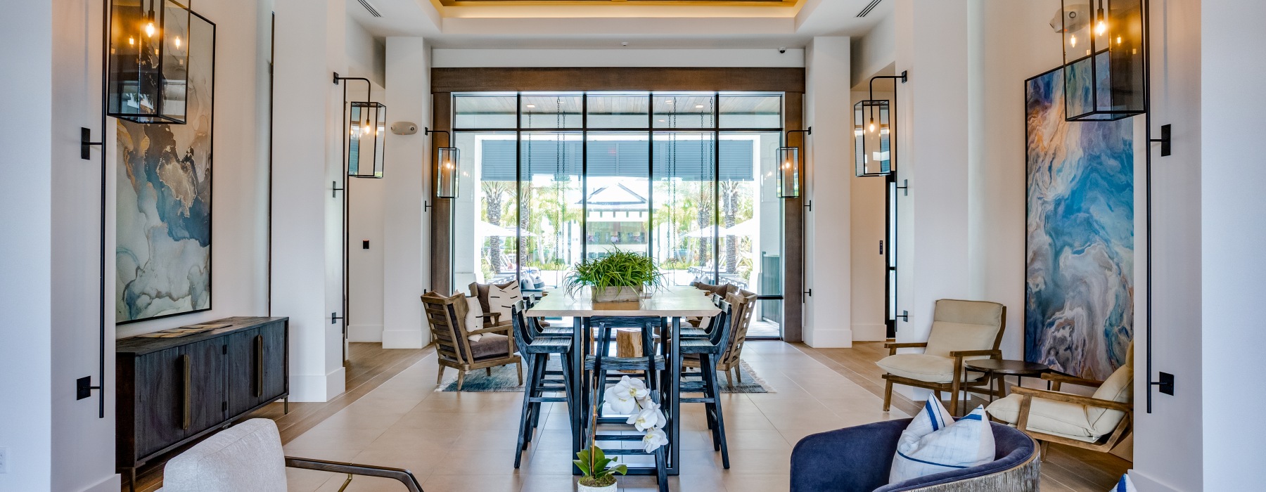 a room with a large window with a view of a patio