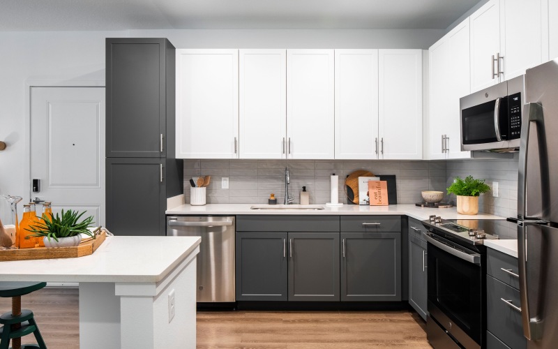 kitchen with grey and white cabinets