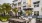 a patio with tables and chairs outside of a building at Jefferson Lake Howel Apartments in Casselberry, FL